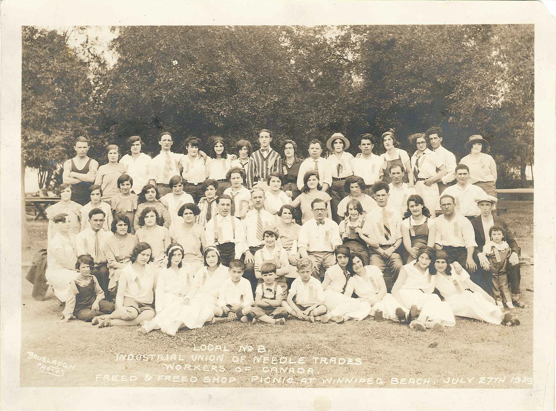 An old group photo of the Industrial Union of Needle Trades from 1929.