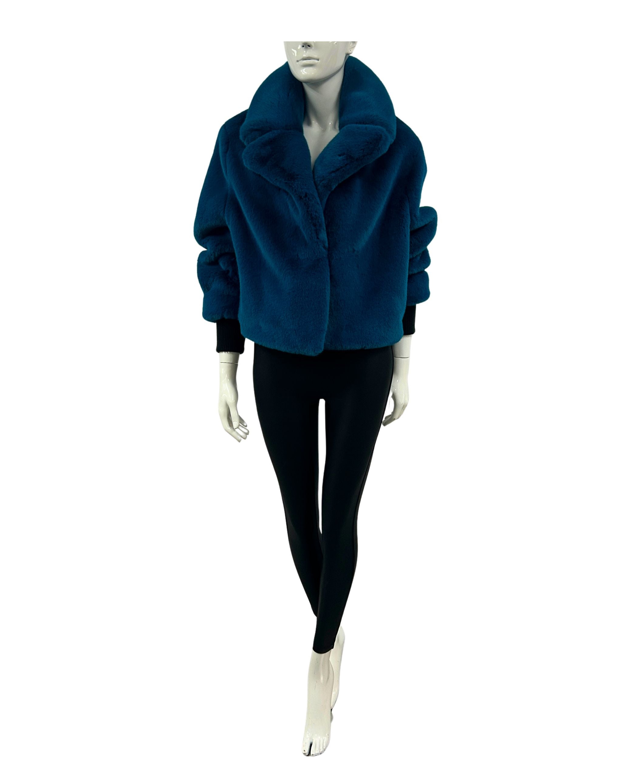 Mannequin wearing a blue jacket in faux fur
